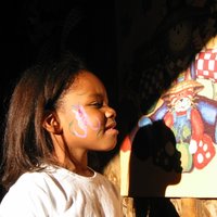 a little girl name Katrina with her face painted