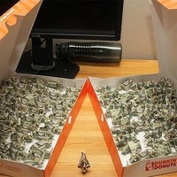 Man pays red light camera fine with 137 $1 bills folded into pigs in donut box