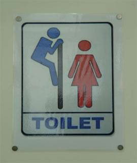 Sign for a toilet