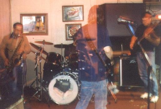 This is me, with me ex-band "Deja Blues" trying to fade away...
