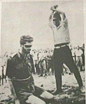 Jap officer about to behead Australian flyer