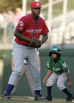 picture of that Gi-Normous 6' 8'' - 256 lb. 13 year-old playing little league