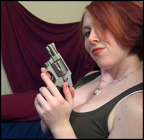 Redhead w/ a gun