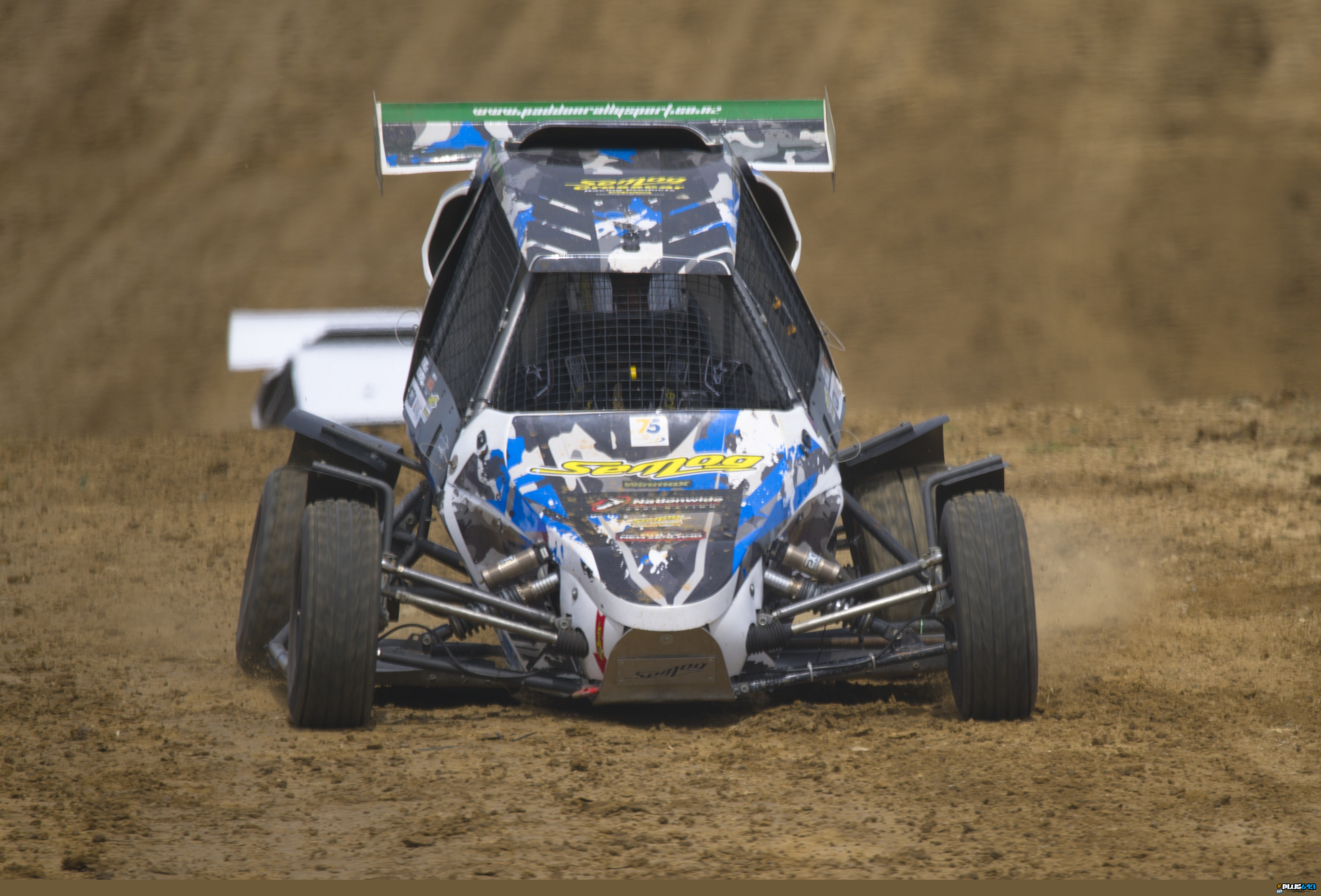Buggy landing after jump at New Zealand Offroad Grand Prix