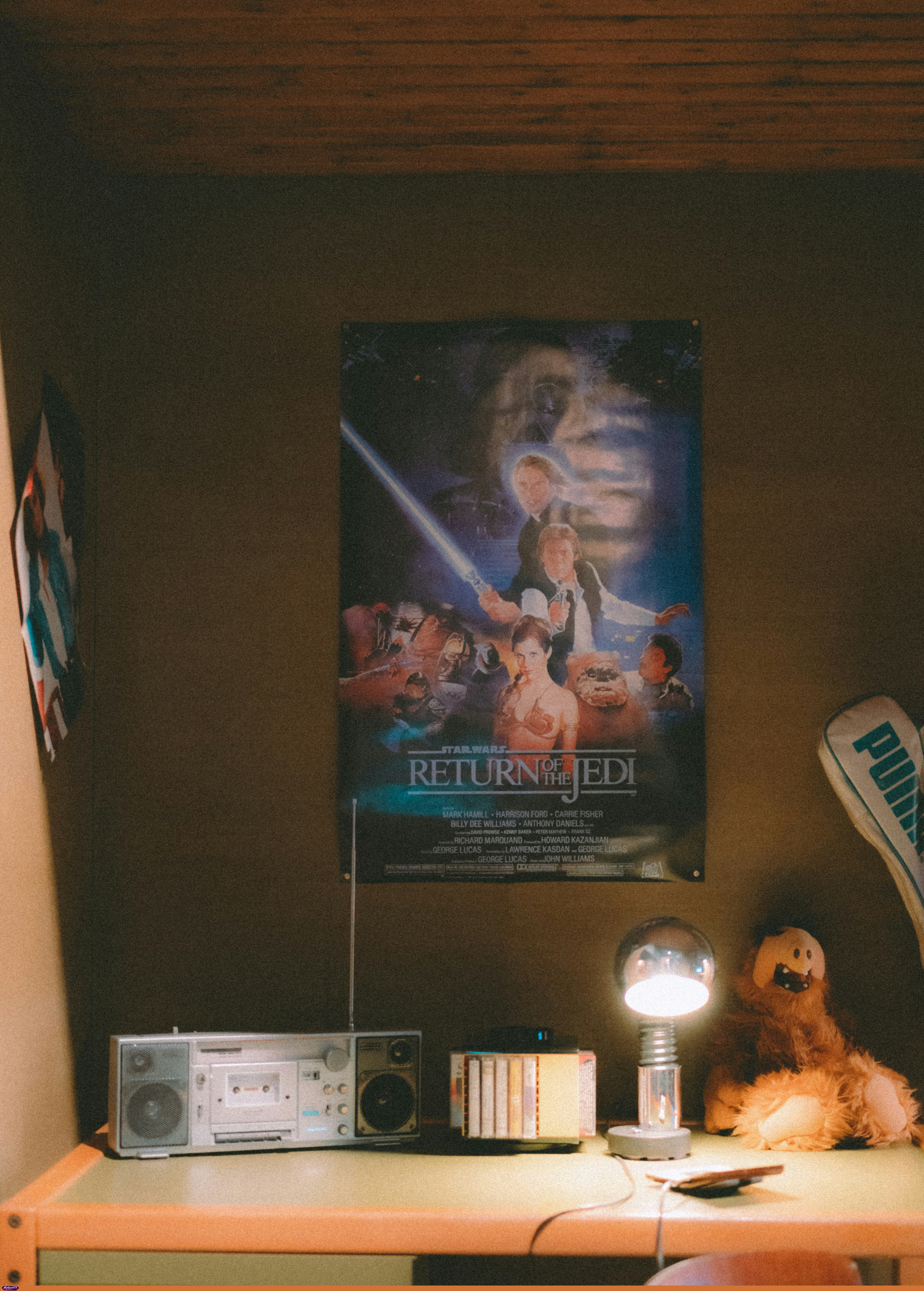 Return of the jedi poster, boombox, and lamp on desk by Georgi Kalaydzhiev