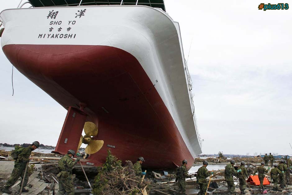 Search for victims around a ship swept out by the tsunami in Higashimatsushima