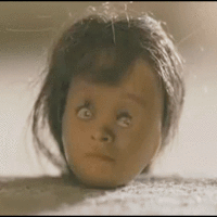 Creepy gif of a doll head