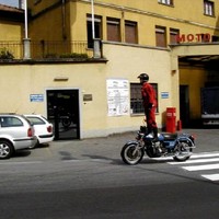 guy standing on his bike