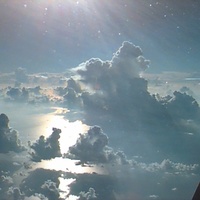 Cloud formation over the sea from above at twilight