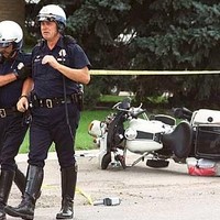 cop crying over his smashed bike