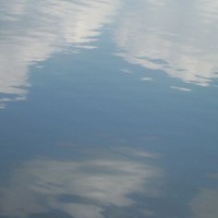 clouds reflecting off lake in WI