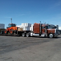 crates, hot tubs, wheel loader