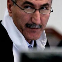 Saddam Judge sees through US bullshit charges vs. Saddam