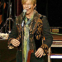David Bowie gets lollipopped off stage