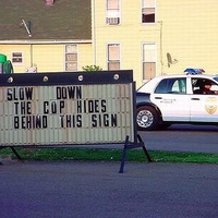 slow down sign