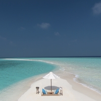 Beach at resort for two.  Where would you rather be?