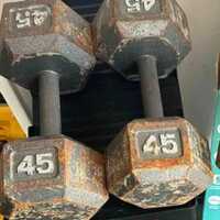 Old, orange tinged, 45 dumbbells