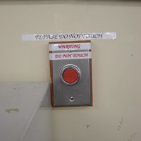 Button for wheelchair assistance at HoJo, N Miami