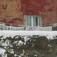 Snow in Genova, March 2005, hanging clothes