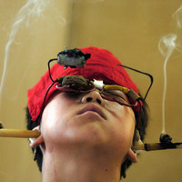 Man smoking something....