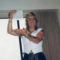 Ozzy Osbourne showing how much sugar he likes in his coffee,1984